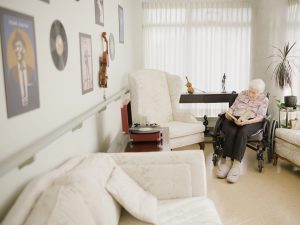 Senior woman in her own room