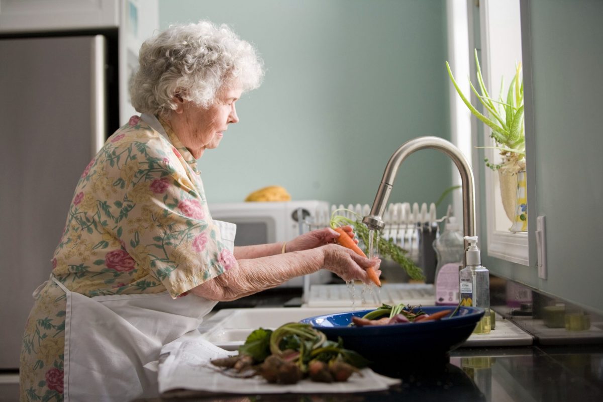 senior woman cooking in the kitchen