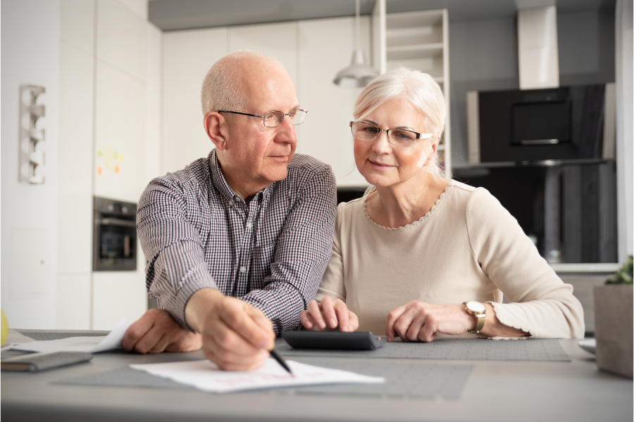 Senior Couple Discussing Investment Lynn Valley Care Centre Blog