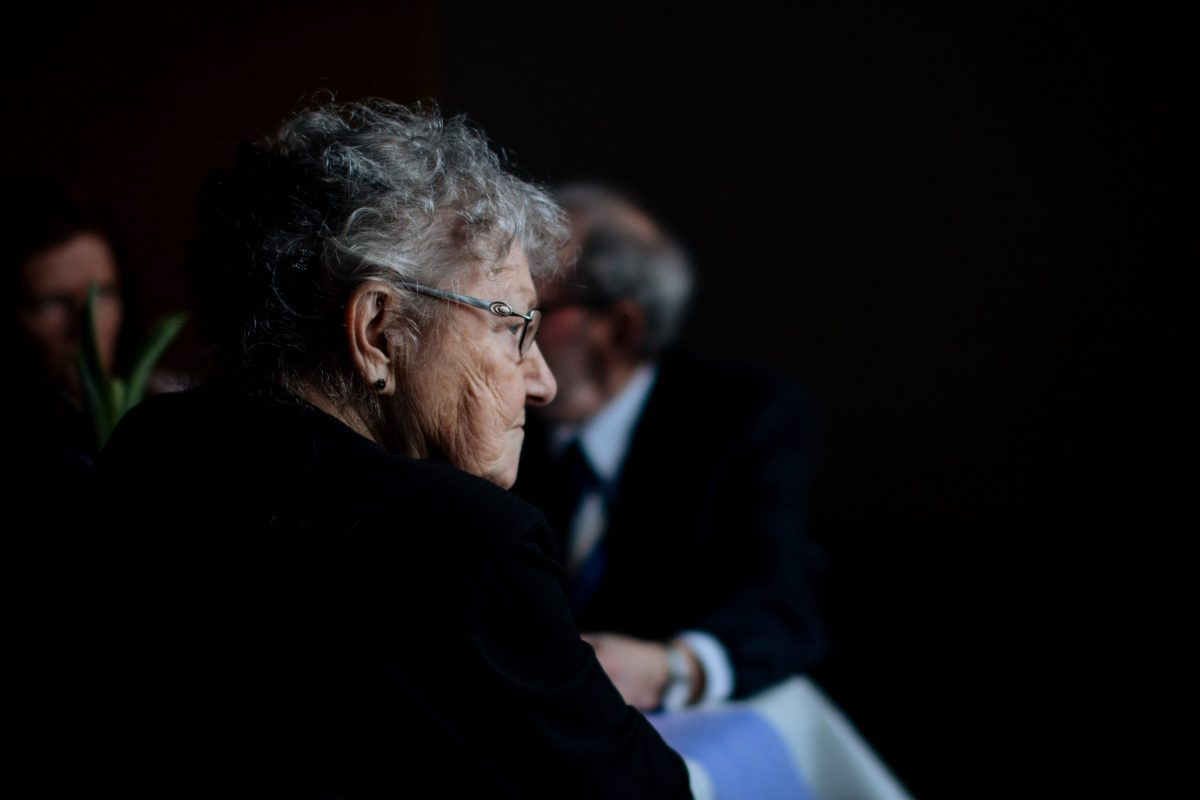 Elderly woman looking disappointed at senior healthcare