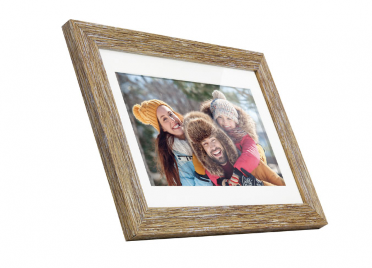 digital picture frame showing smiling family pic