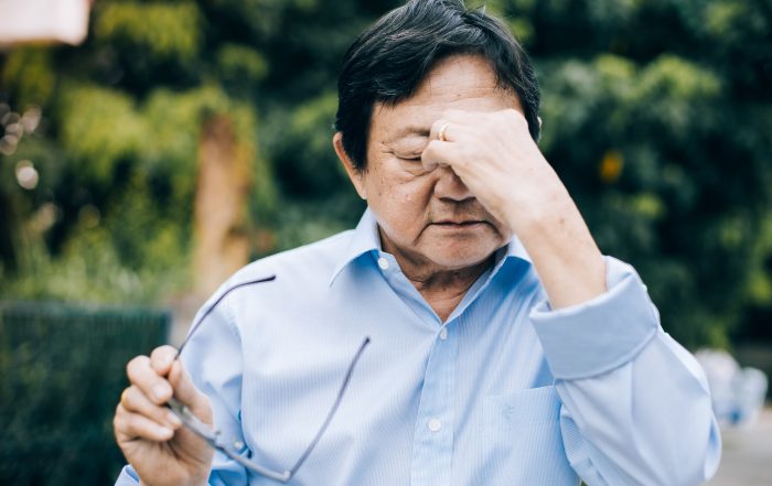 elderly man experiencing aging eyes and common vision problems
